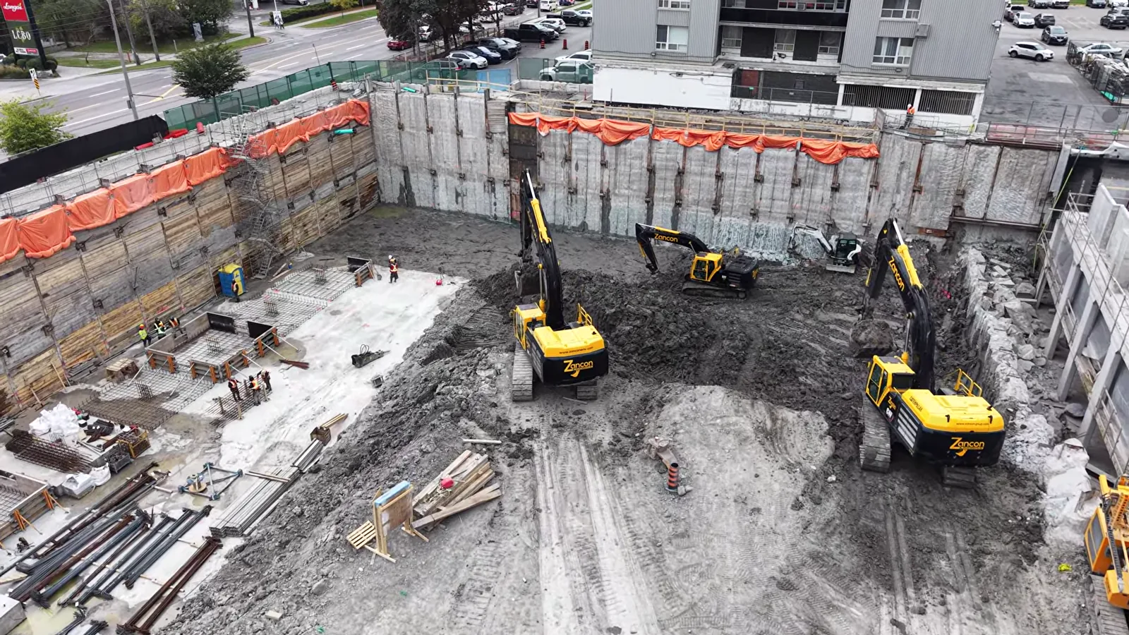 Active Rocklyn construction site with foundation work and excavation equipment